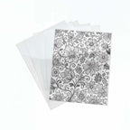 5 Laserfolien für den Siebdruck. Eine Folie bedruckt mit Blumen-Motiv