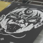 DIY Screen Printing in white on black cardboard
