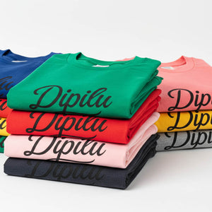 Stacks of T-Shirt printed with Dipilu Logo How To